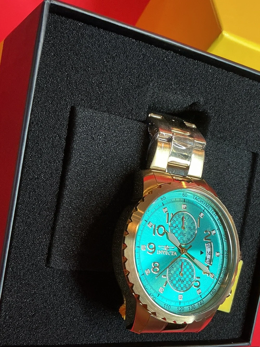 Invicta Gold Tone Watch with Teal Blue Dial